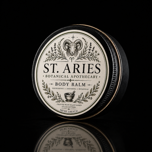 A round metal tin of St. Aries Botanical Apothecary Body Balm, featuring a cream-colored label with black text and a ram illustration, set against a solid black background with a reflection below.